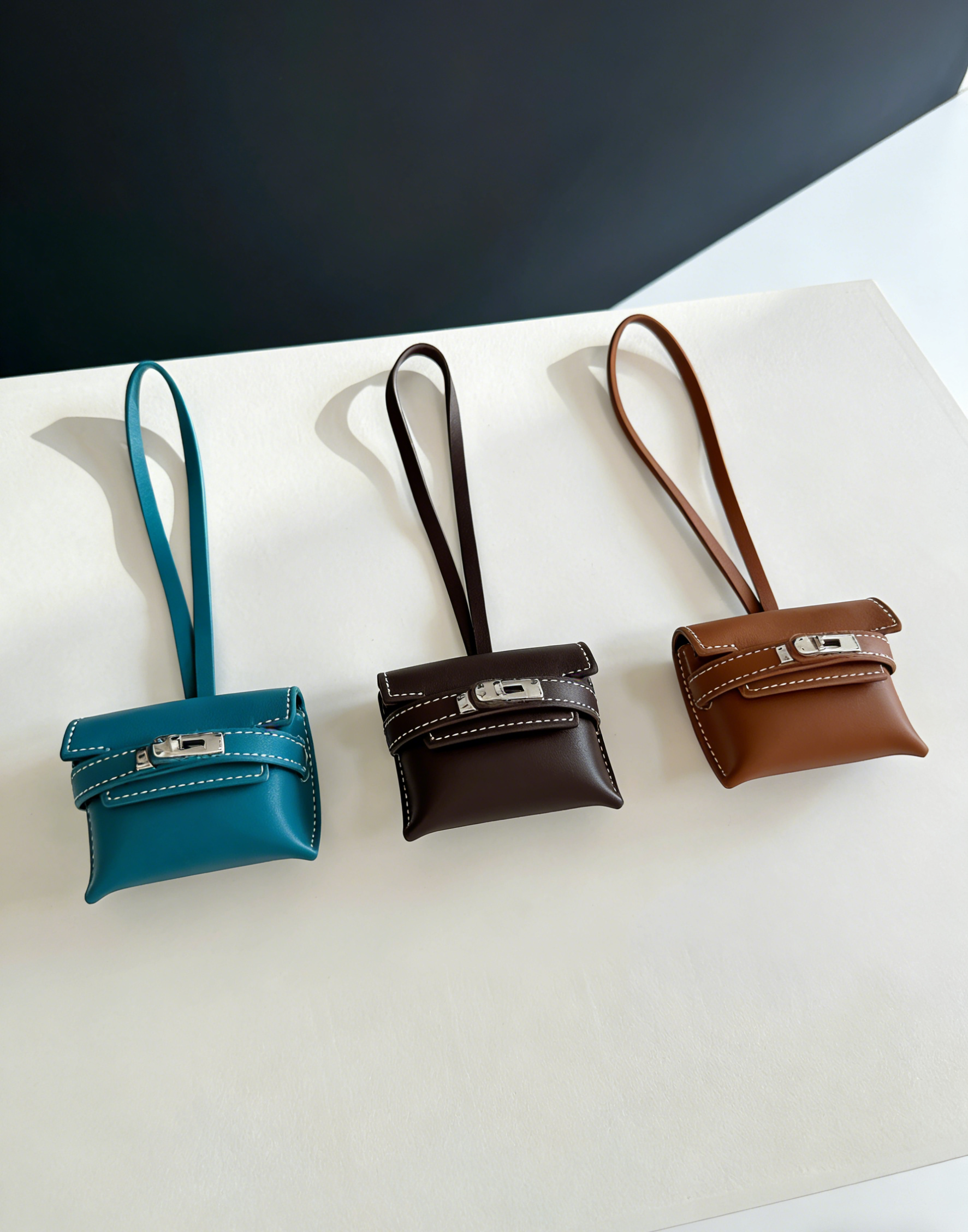 Exquisite "Old Money" Style Headphone Case featuring a Kelly Clasp and Premium Swift Calfskin — A Chic and Playful Bag Charm · Golden Brown